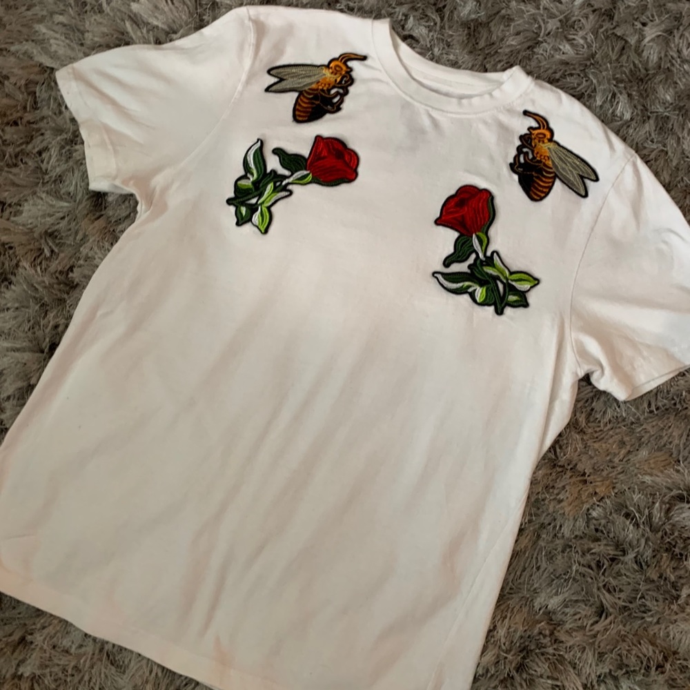 White shirt with embroidered patches